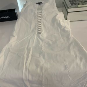 Absolutely stunning Express white dress with straps down center